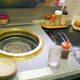 Illustration for article titled In Japan, You Can Get Raw Meat on Conveyor Belts